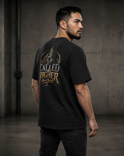 Climb black heavyweight T-shirt with faith journey staircase design - angled back lifestyle view