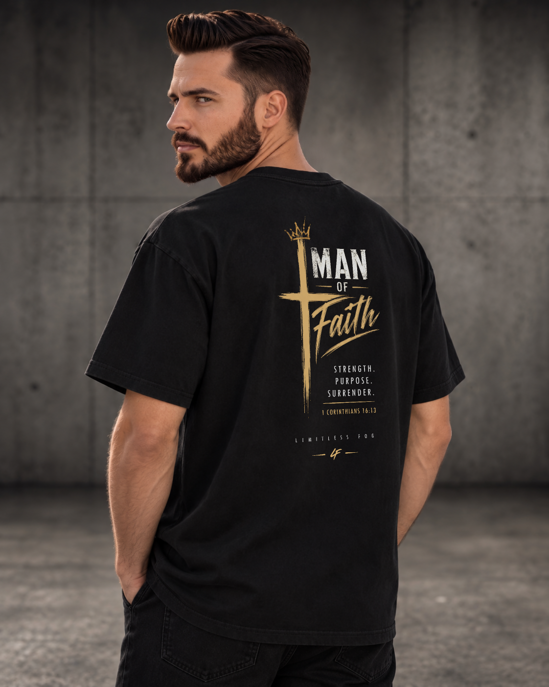 Man of Faith black heavyweight T-shirt with cross design - angled back lifestyle view