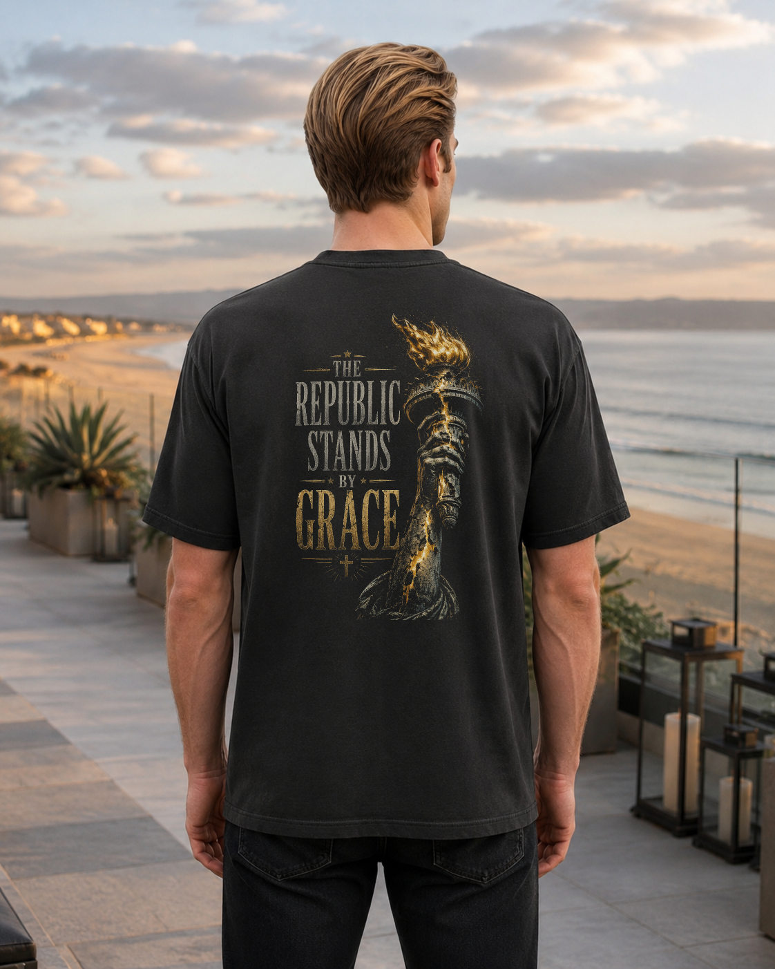 Torch black heavyweight T-shirt with The Republic Stands By Grace design - lifestyle view 1